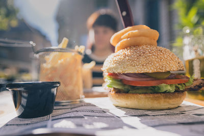 Close-up of burger on table