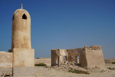 Historic building against clear blue sky