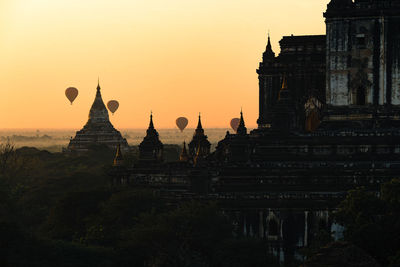 Low angle view of temple against sky during sunset