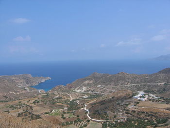 High angle view of landscape by sea against sky