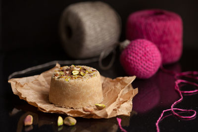 Close-up of cake against black background