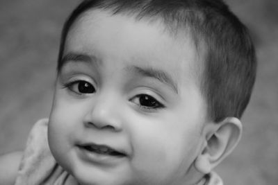 Close-up portrait of cute smiling girl