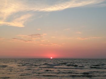 Scenic view of sunset over sea