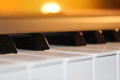 Close-up of piano at home