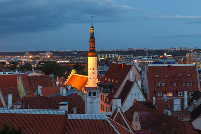 High angle view of illuminated buildings in city against sky