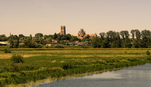 Scenic view of river against clear sky