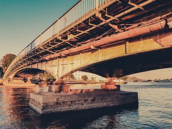 Arch bridge over river