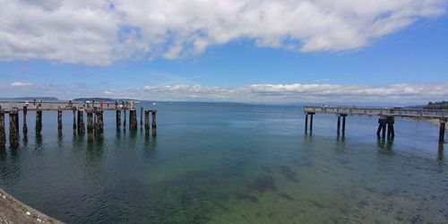 Pier on sea against sky