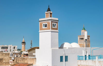 Low angle view of church against clear blue sky