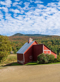 House on field against sky