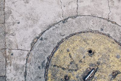 High angle view of weathered hole