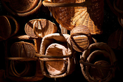 Close-up of hand holding wicker basket