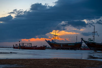 Sunset view with cloudy sky at gadani beach with dhow boat