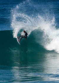 Man surfing in sea