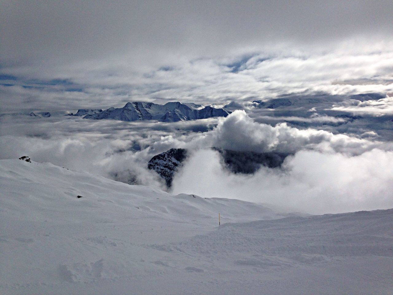 snow, cold temperature, winter, weather, tranquil scene, scenics, sky, tranquility, beauty in nature, mountain, cloud - sky, landscape, cloudy, nature, season, mountain range, snowcapped mountain, covering, white color, non-urban scene