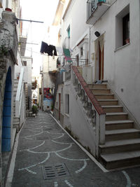 Road amidst buildings