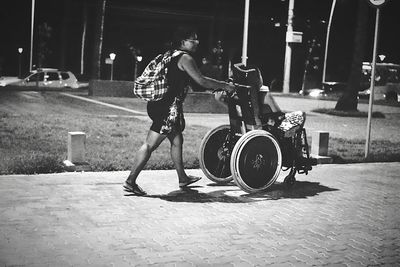 Rear view of man standing on street