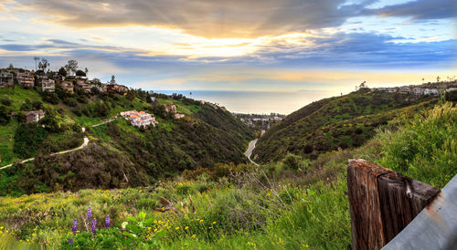 Scenic view of landscape against sky during sunset