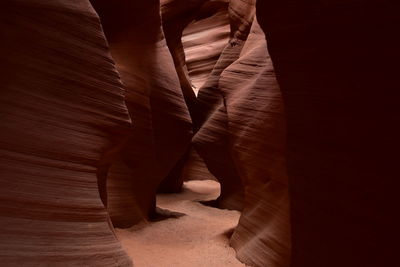 Low section of person standing on rock