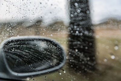 Close-up of wet window in rainy season