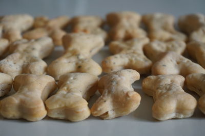 Close-up of dog biscuits on table