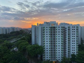 High angle view of buildings against sky during sunset