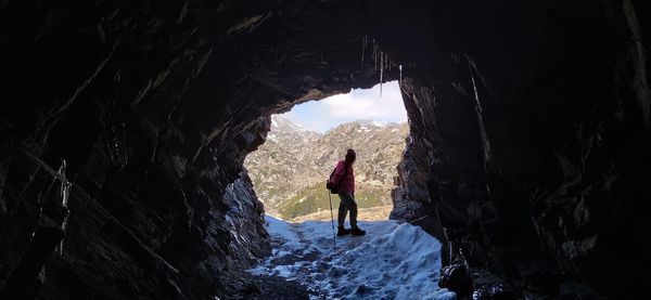 Man standing in cave