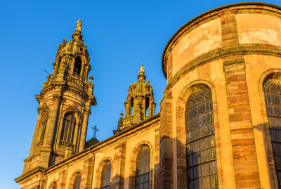 Low angle view of cathedral against blue sky