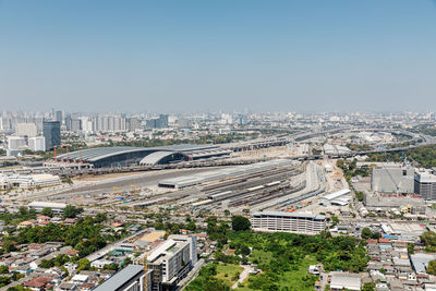 High angle view of buildings against clear sky