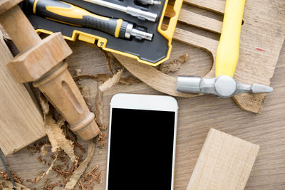 High angle view of mobile phone on table