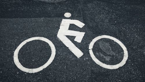 High angle view of bicycle sign on road