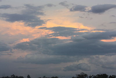 Low angle view of clouds in sky during sunset