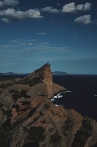 Scenic view of bay against sky