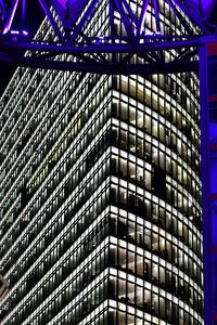 Low angle view of illuminated building at night