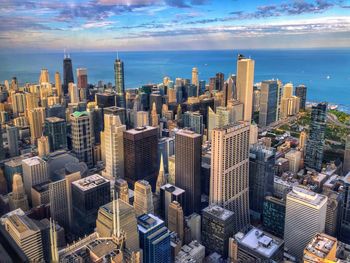 Aerial view of cityscape against sky