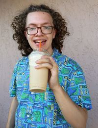 Portrait of a man drinking glass