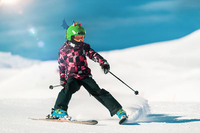 Full length of man skiing on snow