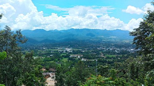 Aerial view of landscape and mountains against sky