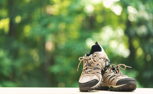 Close-up of shoes on ground