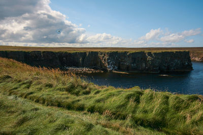 Scenic view of land against sky