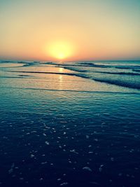 Scenic view of sea during sunset