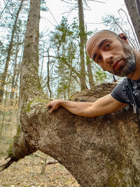 Portrait of young man in forest