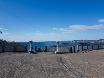 Scenic view of sea against blue sky