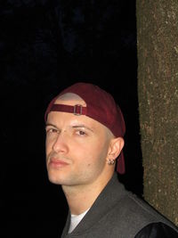 Close-up portrait of a serious young man