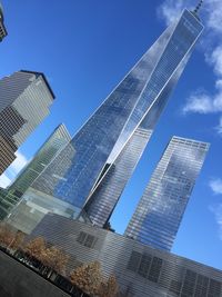 Low angle view of modern buildings against sky