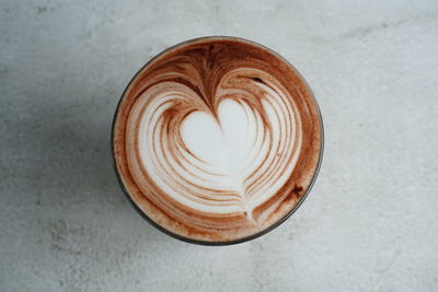 High angle view of coffee cup on table