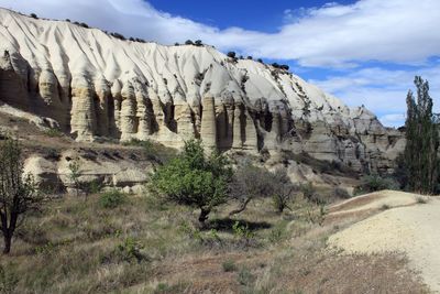 Panoramic view of rocky mountains against sky