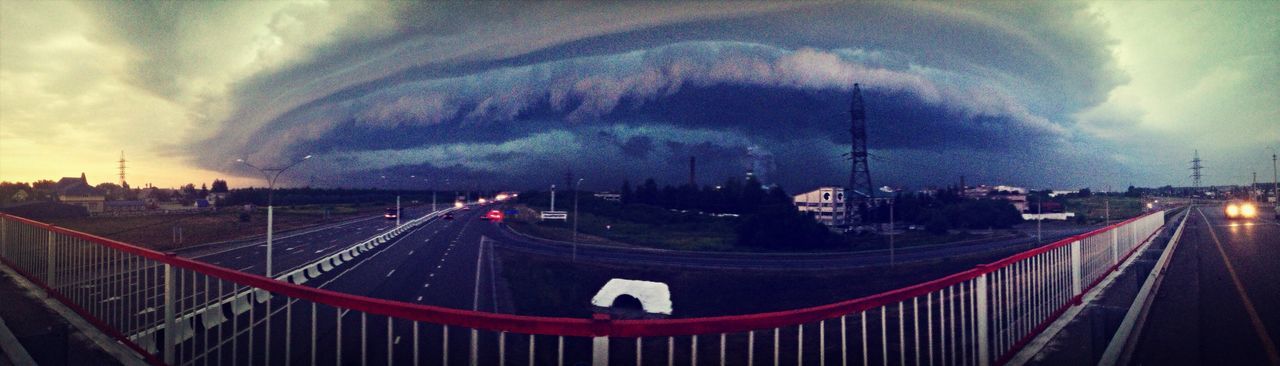 transportation, sky, connection, cloud - sky, the way forward, road, bridge - man made structure, built structure, architecture, high angle view, railing, highway, diminishing perspective, long exposure, vanishing point, cloudy, city, illuminated, road marking, light trail