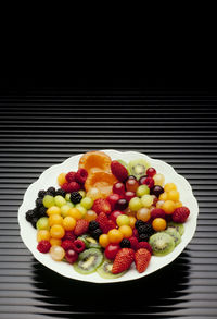 High angle view of fruits in bowl on table