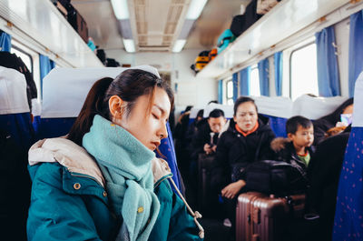 High angle view of people in train